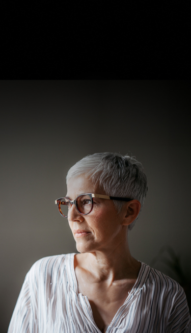 middle aged woman with glasses