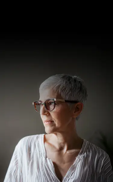 middle aged woman with glasses